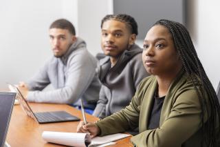Three Coppin students in class